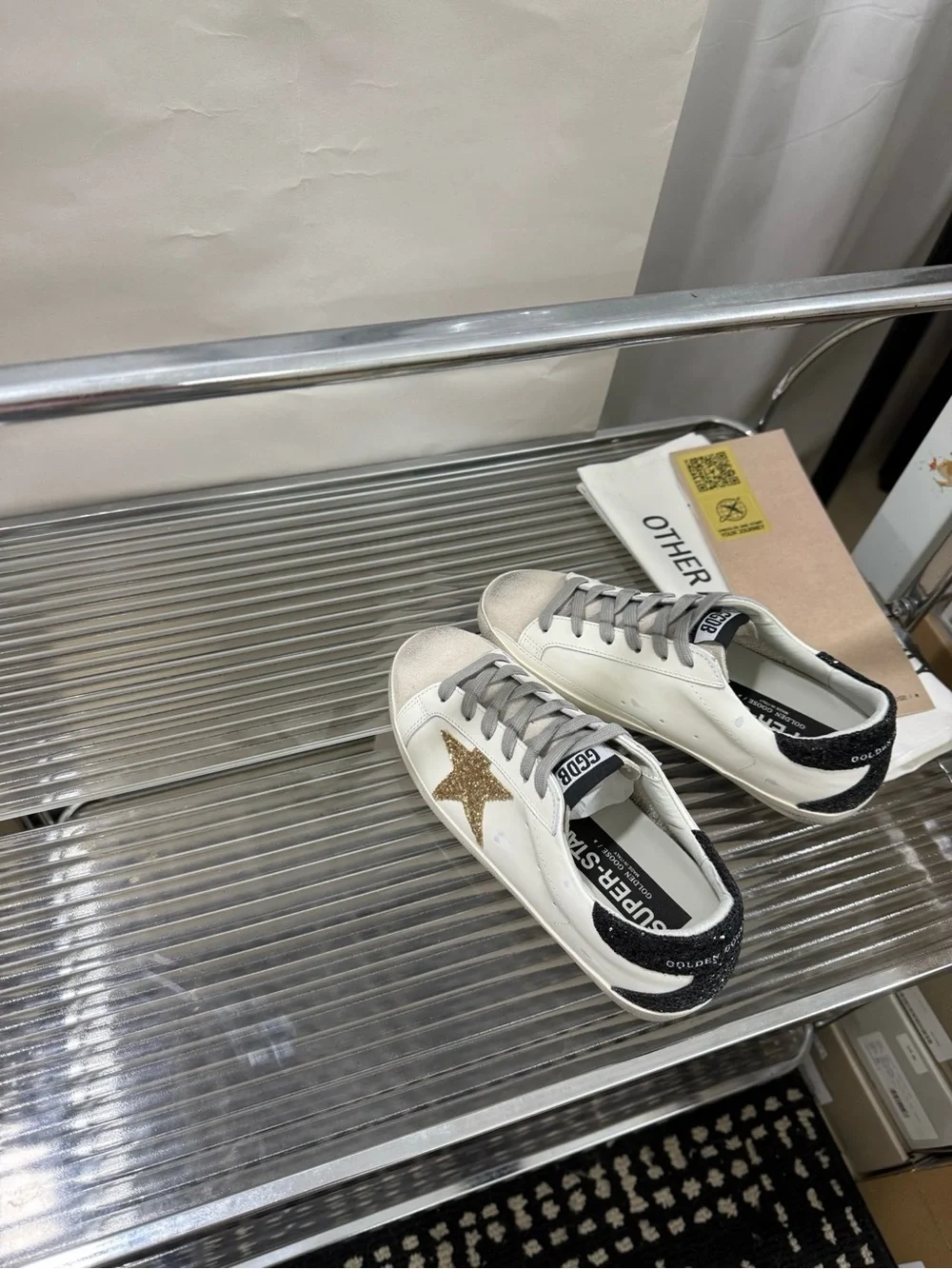 Golden Goose White Leather Sneakers with Gold Glitter Star and Black Heel Accent